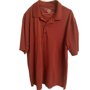 Greg Norman men’s golf polo.   Size Large Maroon